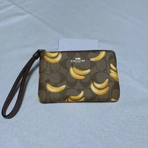 COPY - COACH Wristlet, Banana Print. NWT.